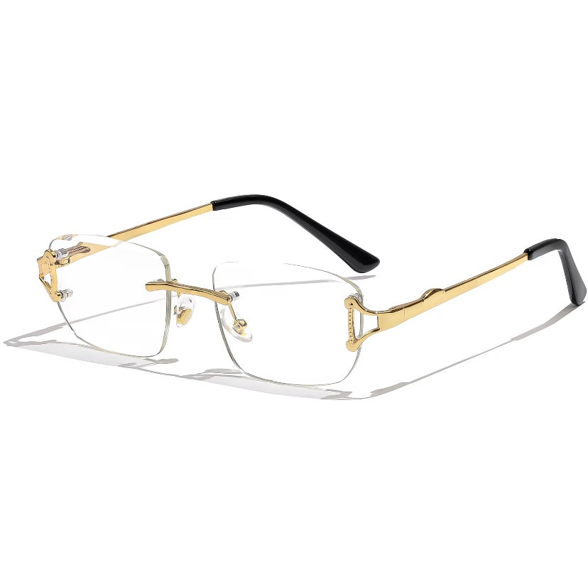 Gold Fashion Glasses by SunglassesLDN. Mens and womens glasses for fashion with a gold frame and clear lens. 